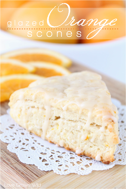 Glazed Orange Scones - a delicious citrusy scone drizzled with an orange vanilla glaze! at LoveGrowsWild.com