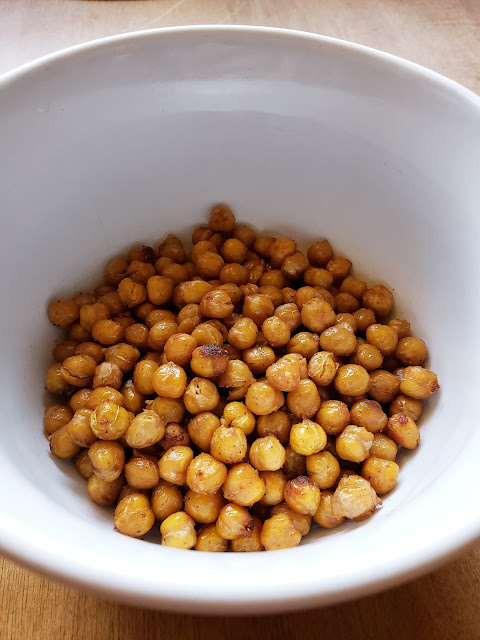 Roasted chickpeas in a white bowl