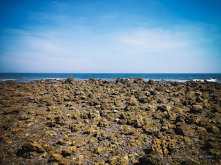 Broad Expanse Chunks Of Rock On Tropical Fishing Beach In The Sunny Morning At The Village Umeanyar North Bali Indonesia