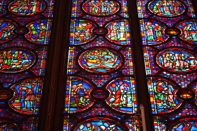 Stained glass windows inside of Sainte Chapelle