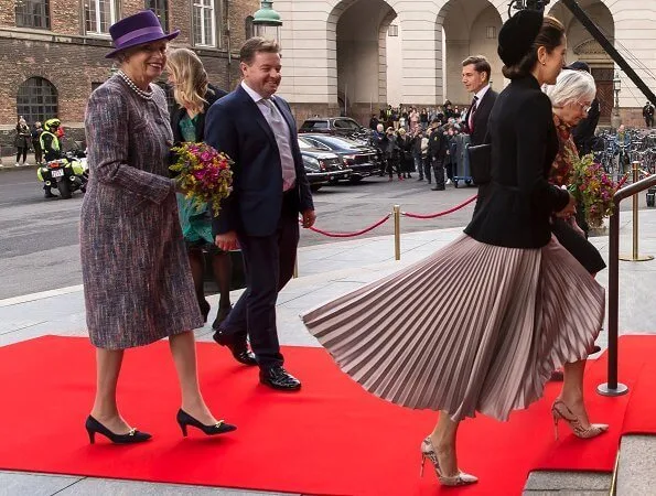 Queen Margrethe, Princess Benedikte. Crown Princess Mary wore a rose gold metallic pleated midi skirt from Asos Design, and a blazer by Max Mara