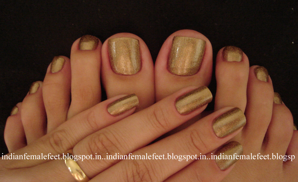 Indian Female feet Golden Toes