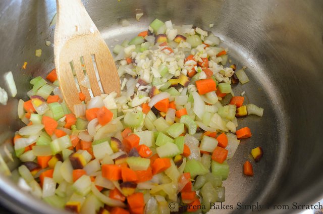 Minestrone Soup Recipe Olive Oil, Onion, Carrot, Celery in a stainless steel soup pot.jpg