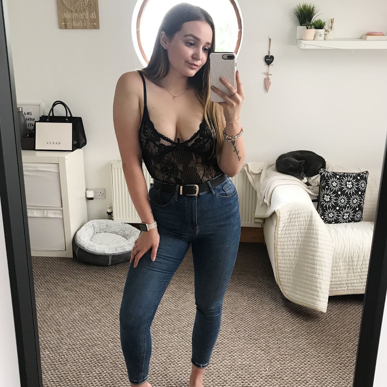 black lace bodysuit with jeans