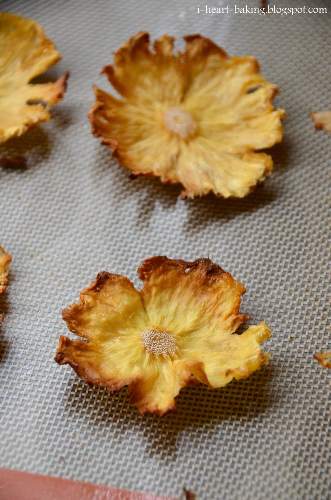 i heart baking! flower surprise inside cake with dried pineapple flower topper for mother's day