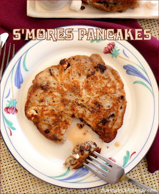 S’mores Pancakes, whether camping or at home, these buttermilk pancakes studded with chocolate and marshmallow are a sweet breakfast treat. | recipe developed by www.BakingInATornado.com | #recipe #breakfast