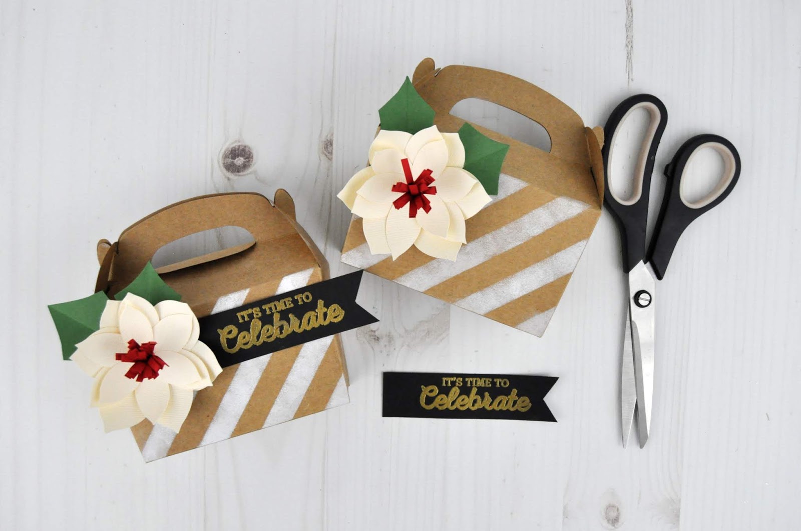 Christmas Gift Boxes with 3D Poinsettia Paper Flowers. Jen Gallacher uses boxes from JoAnn and die cut shapes from Silhouette to create this Christmas craft. #christmascraft #papercrafter #silhouette #jengallacher Christmas Gift Boxes with 3D Poinsettia Paper Flowers. Jen Gallacher uses boxes from JoAnn and die cut shapes from Silhouette to create this Christmas craft. #christmascraft #papercrafter #silhouette #jengallacher