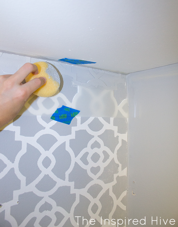 Part one of a beautiful walk in closet makeover! How to stencil a feature wall using Royal Design Studio stencils.