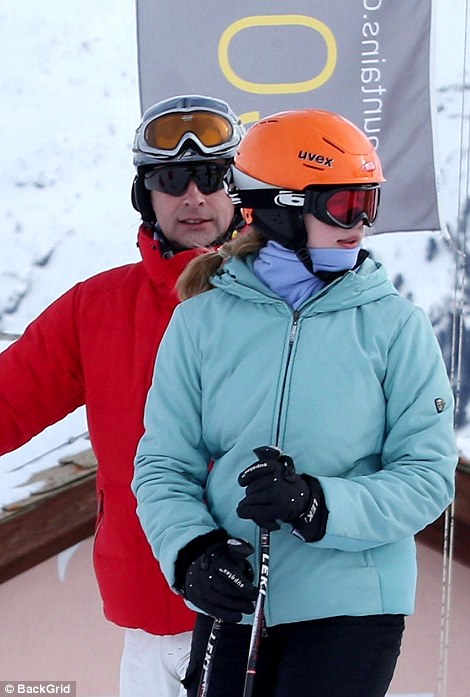 495843A400000578-5405661-Wrapped_up_in_a_vibrant_turquoise_ski_jacket_and_orange_helmet_t-m-112_1518961030116.jpg
