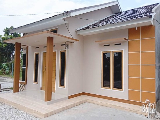 rumah minimalis kombinasi warna coklat krem dan orange kuning emas