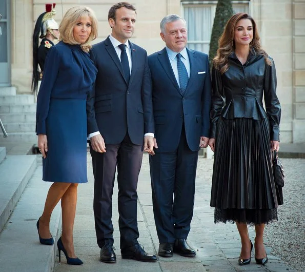 Queen Rania carried LOUIS VUITTON chain bag. President Emmanuel Macron and his wife Brigitte Macron at Elysee Palace