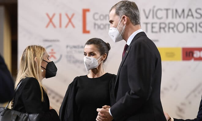 Queen Letizia wore a new black puff-sleeve taffeta knit top and trousers from Manuel Pertegaz
