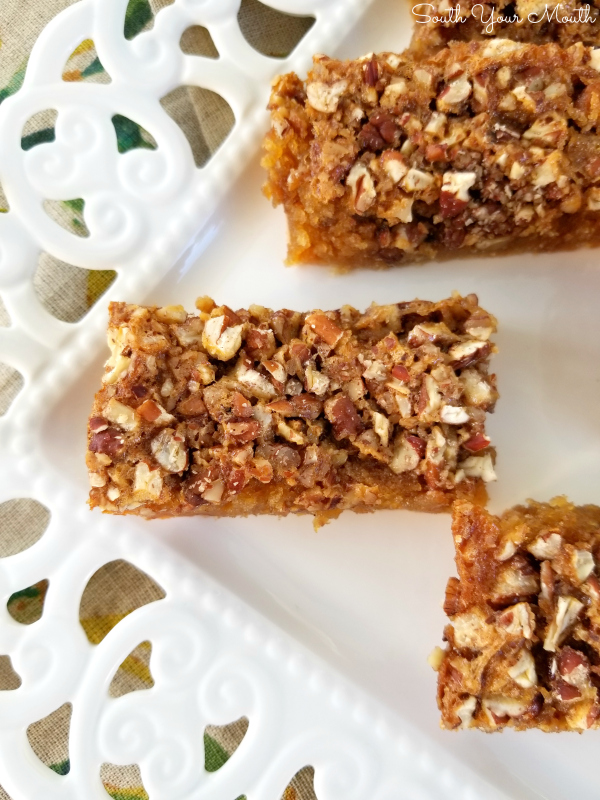 Easy Pecan Pie Bars! All the fabulous flavor of pecan pie in a chewy, gooey bar recipe made easy with a cake mix base.