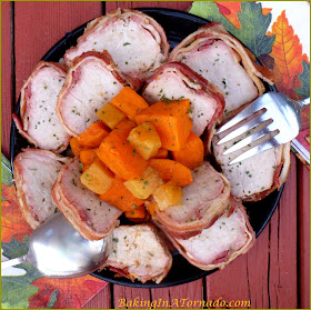 Maple Pineapple Pork Tenderloin, pork tenderloin wrapped in bacon with sweet potatoes and pineapple slow cooked in an easy sauce. | Recipe developed by www.BakingInATornado.com | #recipe #CrockPot #dinner