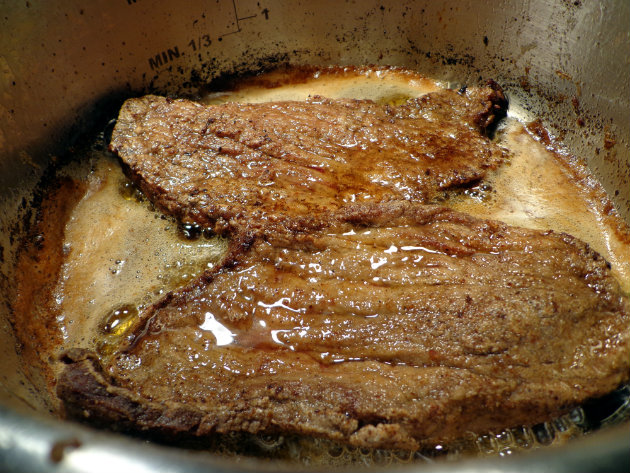 saute the meat in hot oil and butter