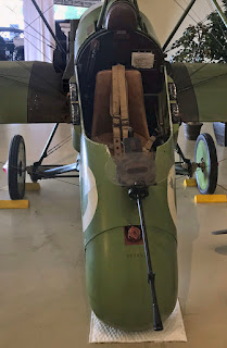 Replica F.E.8 fighter plane on display in museum.