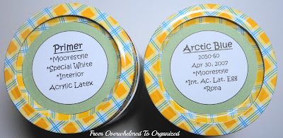 From Overwhelmed to Organized. Top view of labeled jam jars used for storing touch up paint for walls.