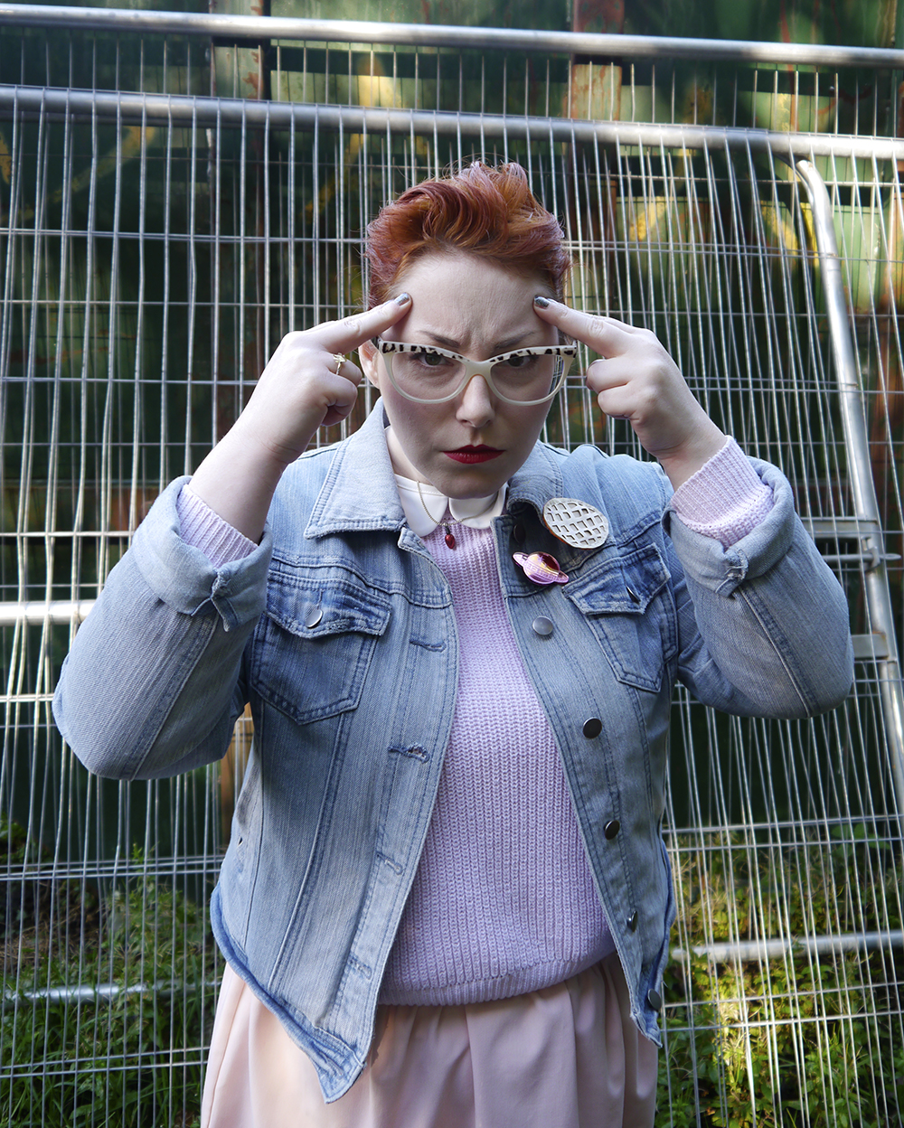 Mind control: Outfit inspired by Eleven from Stranger Things unlikely style icon, costume inspiration, Stranger Things, Eleven from Stranger Things, Stranger Things inspired outfit, Spex Pistols glasses, Cheap Frills christmas light necklace, denim jacket, pink outfit, Eat Me do socks , Wear Eponymous skirt, Eggo brooch, bonnie bling brooch, Lucky Dip club brooch