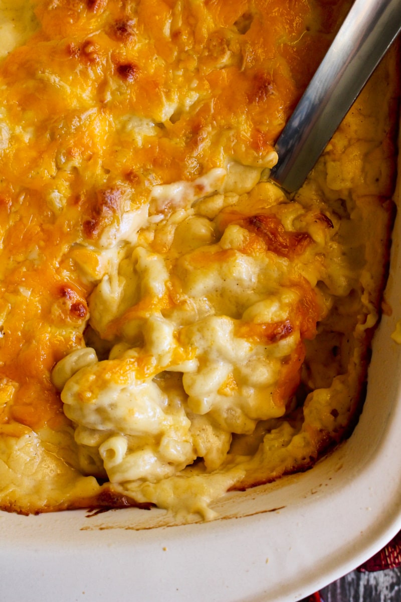 This Extra Creamy Baked Macaroni and Cheese recipe is made with an irresistibly rich and silky cheddar cheese sauce. It is the creamiest, cheesiest baked mac and cheese ever!