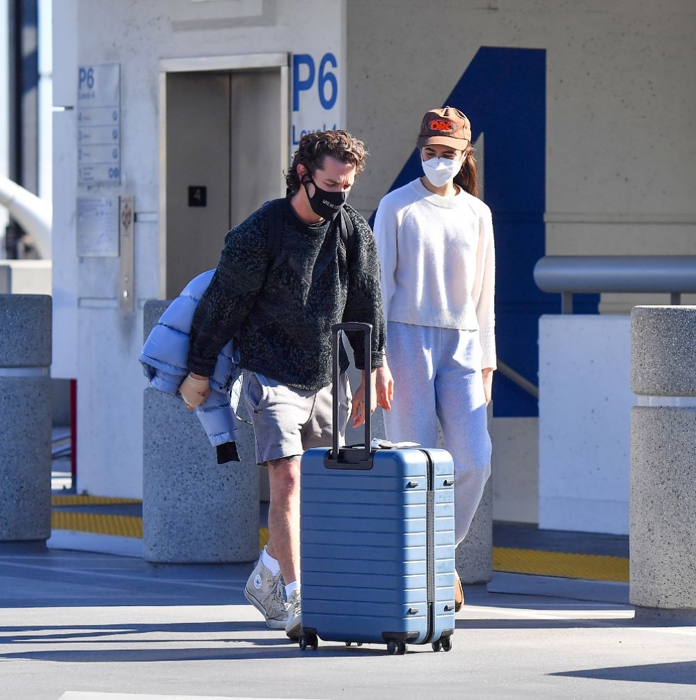 Margaret Qualley and Shia LaBeouf Out Kissing at LAX Airport 19 Dec-2020