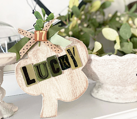 Wooden shamrock with LUCKY letters on the mantel