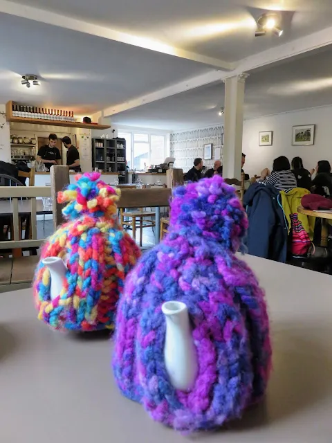 Knitted tea cosies at the Warehouse Cafe in Birmingham, England