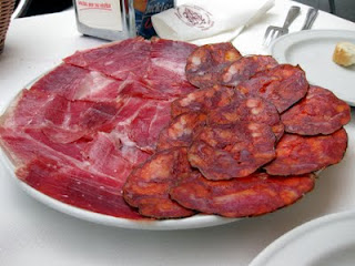 Cured ham and sausage made from those same pigs.