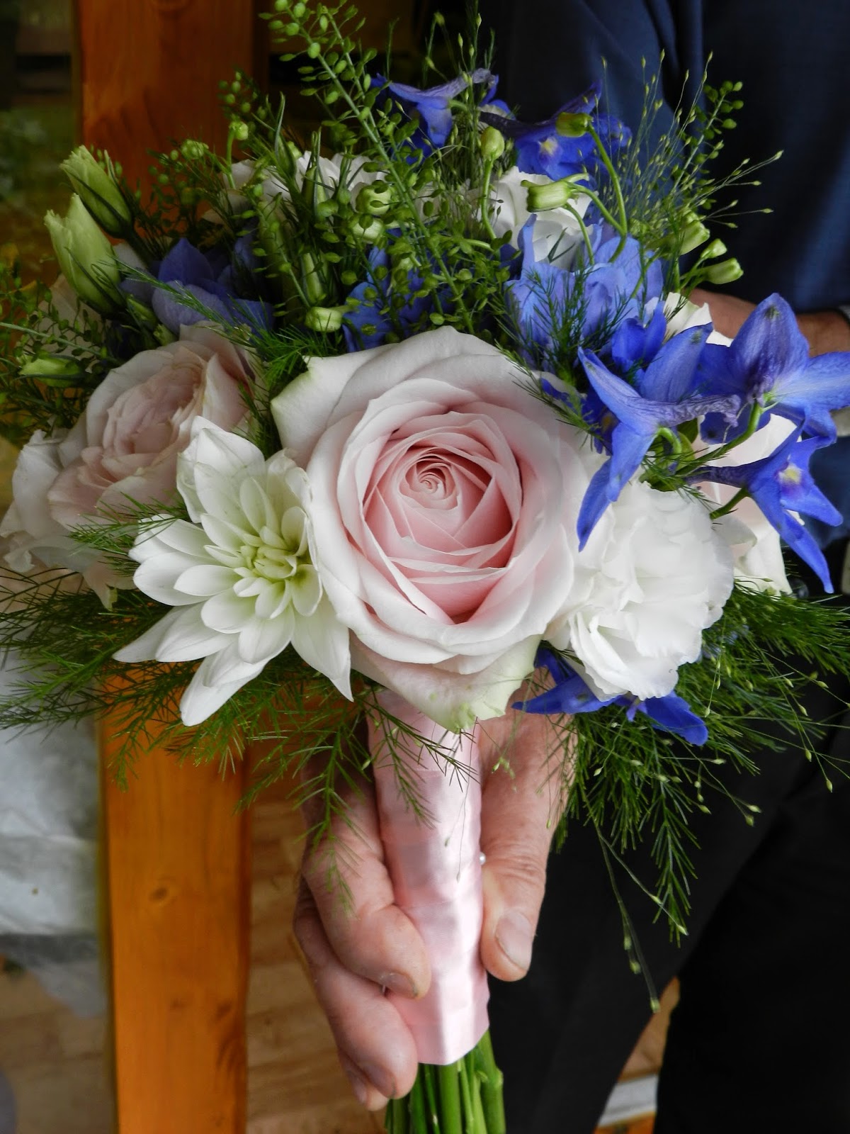 Sandra's Flower Studio. Pink, blue and white bridal party flowers