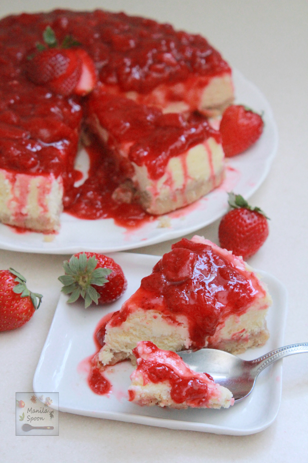 Deliciously creamy and fruity cheesecake with a luscious sweet-tangy strawberry sauce that brings this dessert over the top. Best way to welcome Spring!