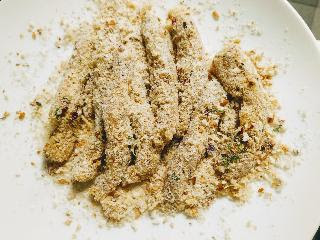 Flour and bread crumbs coated chicken fingers