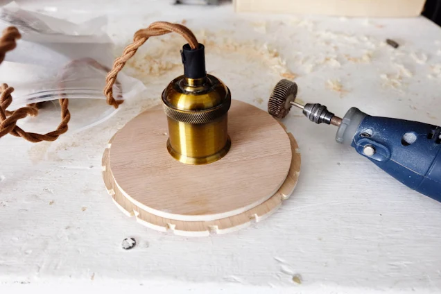 fitting pendant lamp parts into wood base