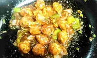 Stir fried chicken balls in manchurian sauce