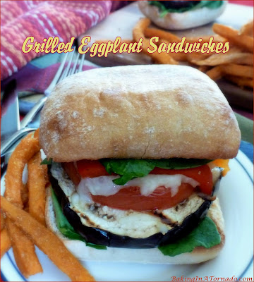 Grilled Eggplant Sandwiches are a healthy, hearty meal. Grilled eggplant is topped with cheese and vegetables, and served on a toasted Ciabatta. | Recipe developed by www.BakingInATornado.com | #recipe #sandwich