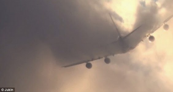 254408BC00000578 0 image a 2 1422869150853 Moment world's largest passenger jet slices through clouds and leaves mesmerising display in its wake
