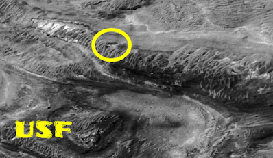 UFO-is-on-Mars-definitely-and-a-structure-on-the-side-of-a-mountain-means-nothing-to-nasa-but-that-really-looks-out-of-place.