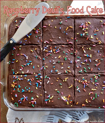 Raspberry Devil’s Food Cake, a moist, fluffy chocolate raspberry cake with a thick chocolate raspberry frosting. | Recipe developed by www.BakingInATornado.com | #recipe #chocolate