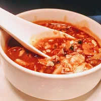 Serving hot and sour soup chicken