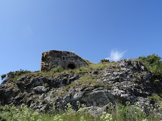 The Monk’s Cave, a small stone building perched above a rock face on Charles Hill, Aberdour.  Photo by Kevin Nosferatu for the Skulferatu Project.