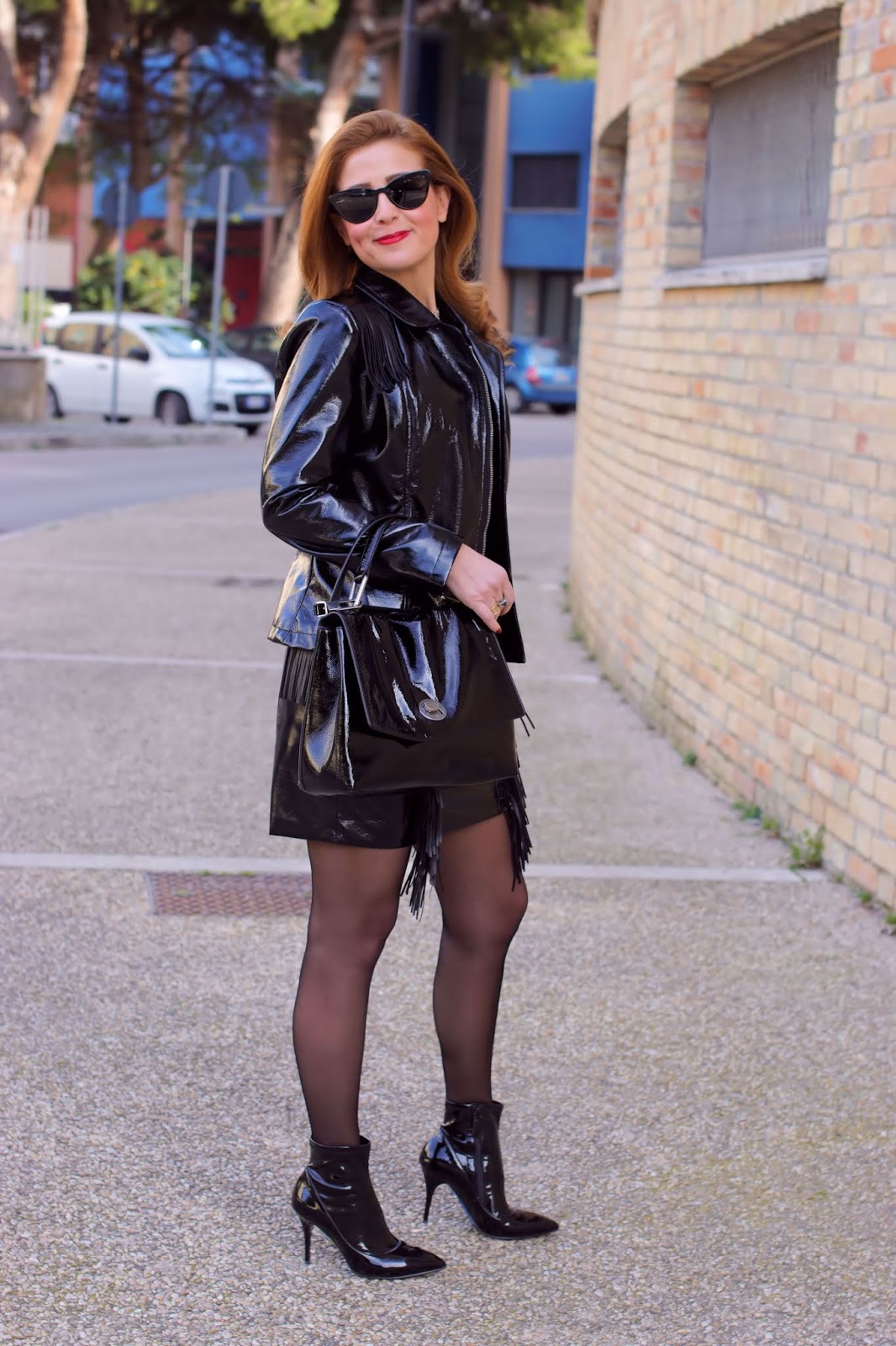 How to wear the Vinyl trend: vinyl miniskirt and sheer tights on Fashion and Cookies fashion blog, fashion blogger style