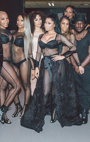 2 Photos: Nicki Minaj shows off curves in sheer performance outfit