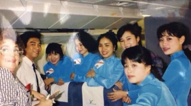 Đồng phục áo dài xanh thiên thanh vietnam airlines