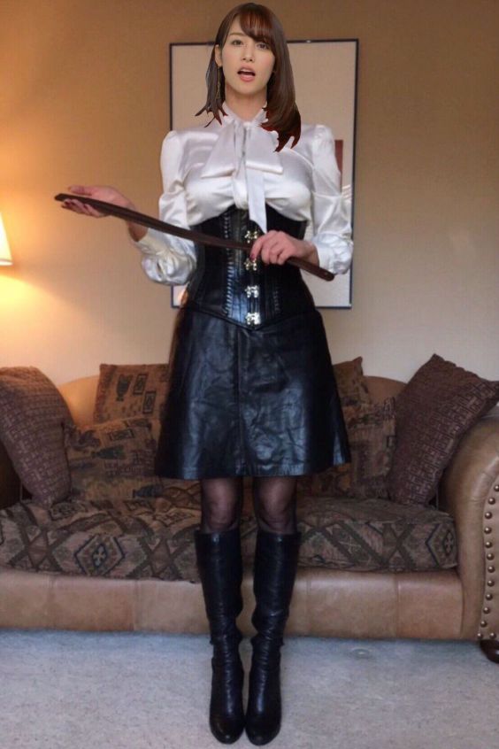 Strict woman in pantyhose and boots