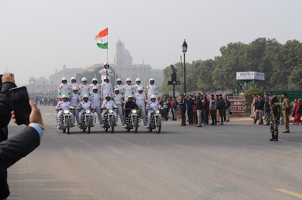 jawan on bike with flag