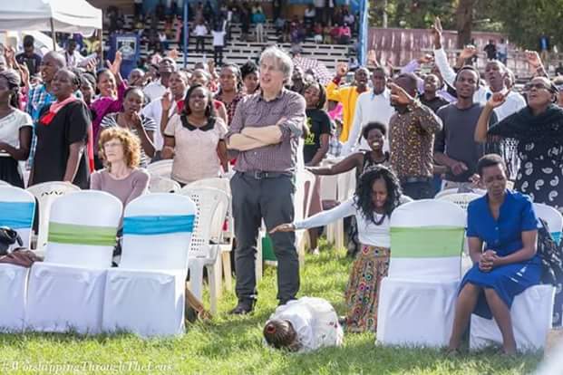 Viral photos of 3-year-old girl on her knees and in tears as she prays and worships God during a church service