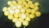 Frying gulab jamun balls in ghee(oil) for gulab jamun recipe