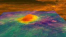 This figure shows the volcanic peak Idunn Mons (at 46 degrees south latitude, 214.5 degrees east longitude) in the Imdr Regio area of Venus. The colored overlay shows the heat patterns derived from surface brightness data collected by the Visible and Infrared Thermal Imaging Spectrometer (VIRTIS), aboard the European Space Agency's Venus Express spacecraft