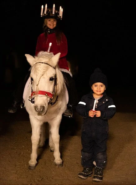 Princess Estelle and Prince Oscar come to greet Christmas. Happy Lucia Day