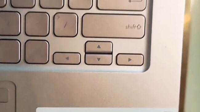 Small and very closely placed 4 arrow keys.