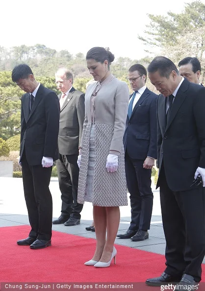 Crown Princess Victoria of Sweden and Prince Daniel of Sweden pay a silent tribute at Seoul National Cemetery during their visit to South Korea