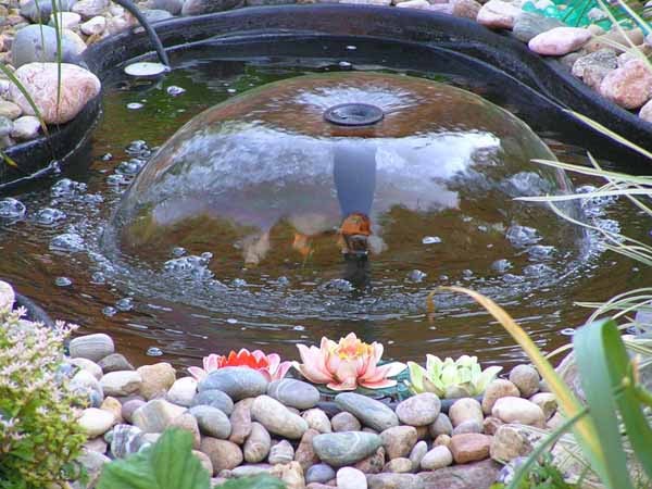Delightful Home Water Fountains Front Yard And Backyard Designs Water Fountains Make Stunning Backyard Or Front Yard Decorations With Green Plants And Flowers Creating A Wonderful Focal Point Of